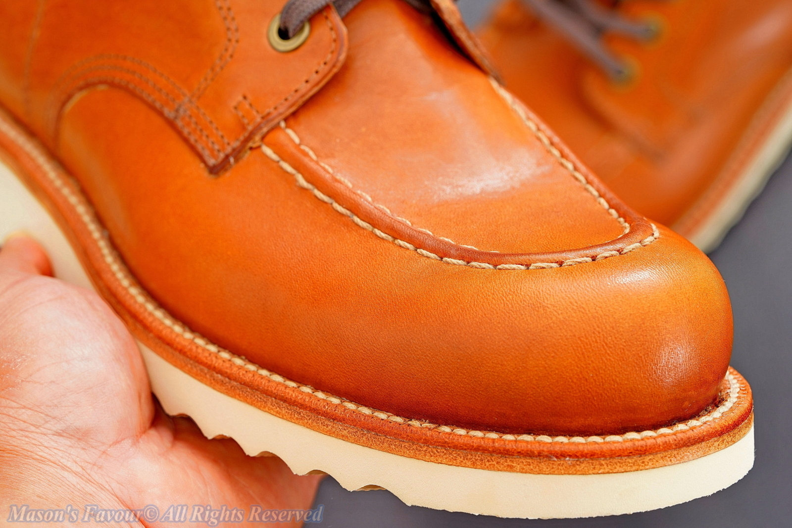Grant Stone Brass Boot Saddle Tan - Hand Holding 1