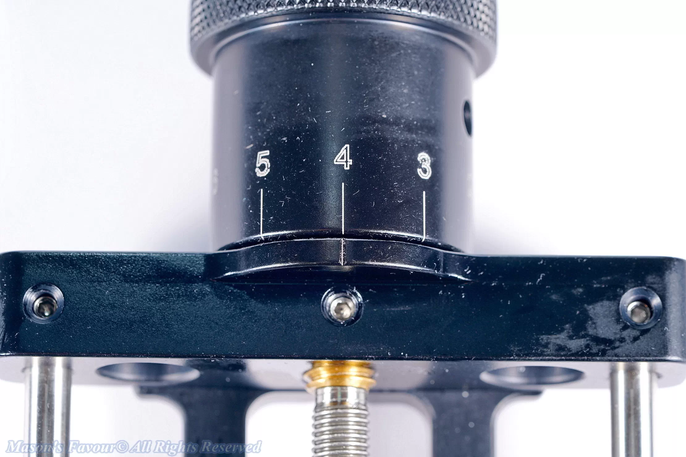 Hejnar Macro Focusing Rail MS5P-10-KS - Enlarged view 2 of Dial, its geometric axis is tilted from a rotation axis so its inner surface facing the frame is also tilted and wears the surface of the frame, and no washer is mounted between the dial and the frame to prevent the contact and wearing
