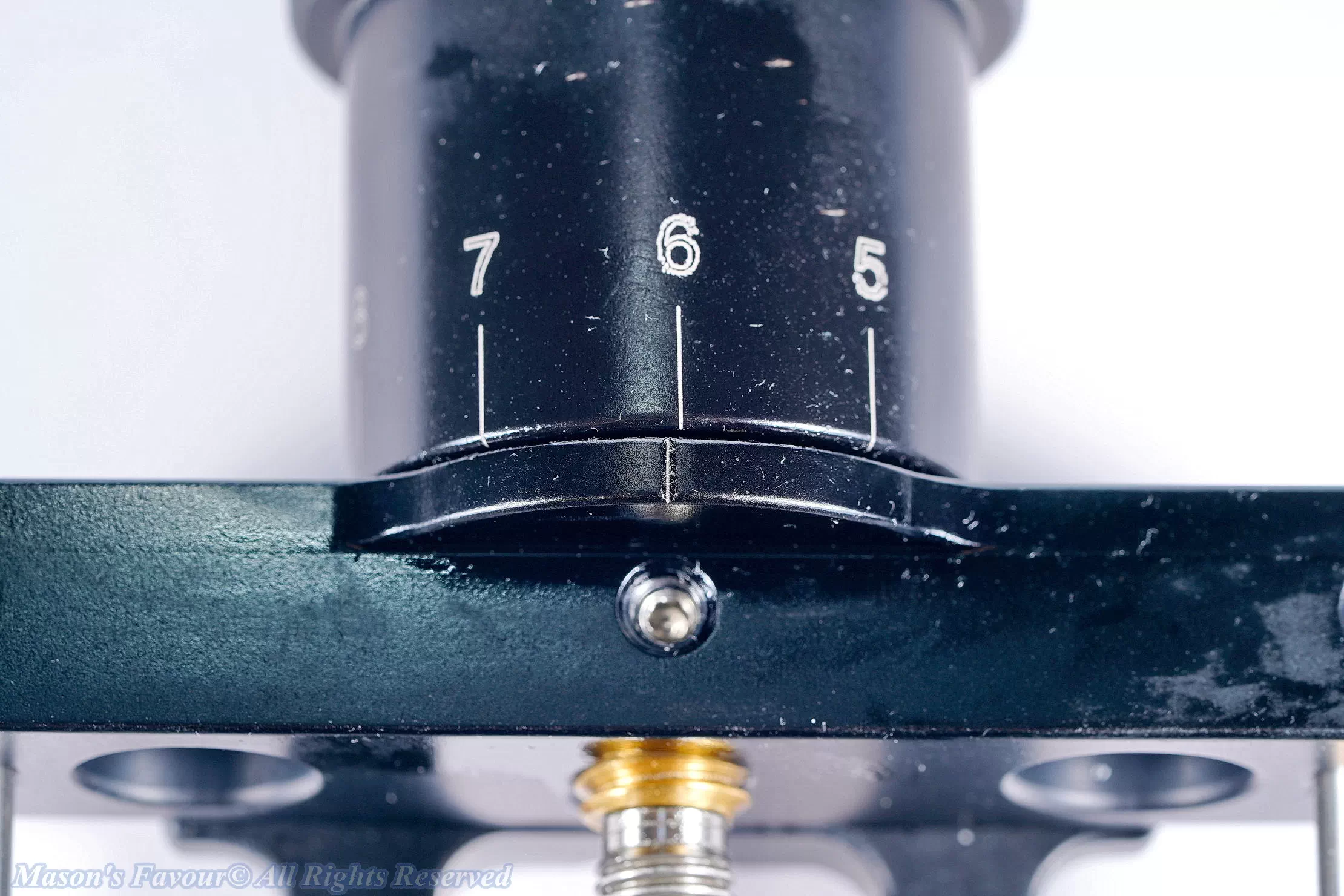 Hejnar Macro Focusing Rail MS5P-10-KS - Enlarged view 3 of Dial, its geometric axis is tilted from a rotation axis so its inner surface facing the frame is also tilted and wears the surface of the frame, and no washer is mounted between the dial and the frame to prevent the contact and wearing