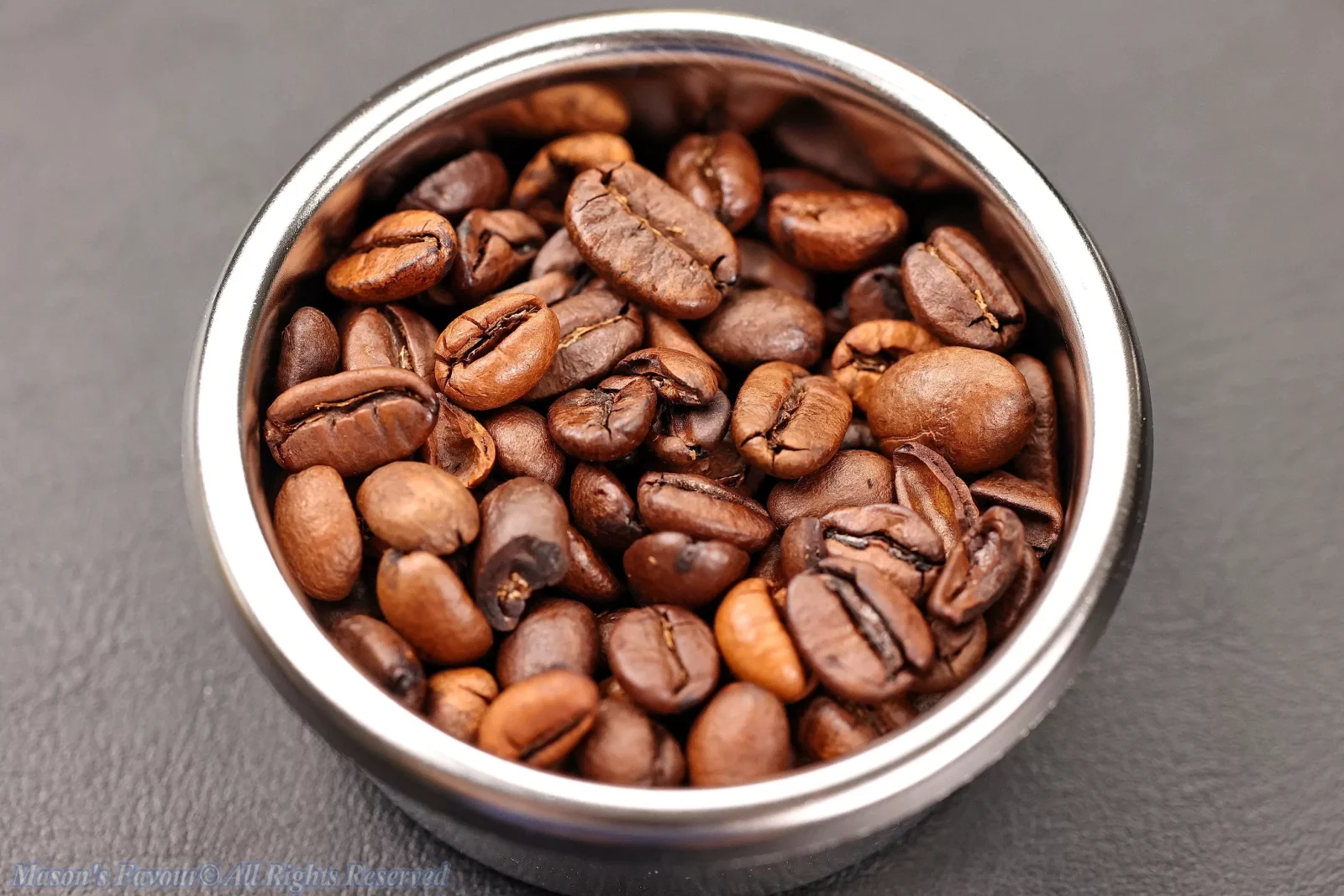 IMS Espresso Portafilter Basket - Flat Basket (B702TFH28), with Coffee Beans, Perspective View