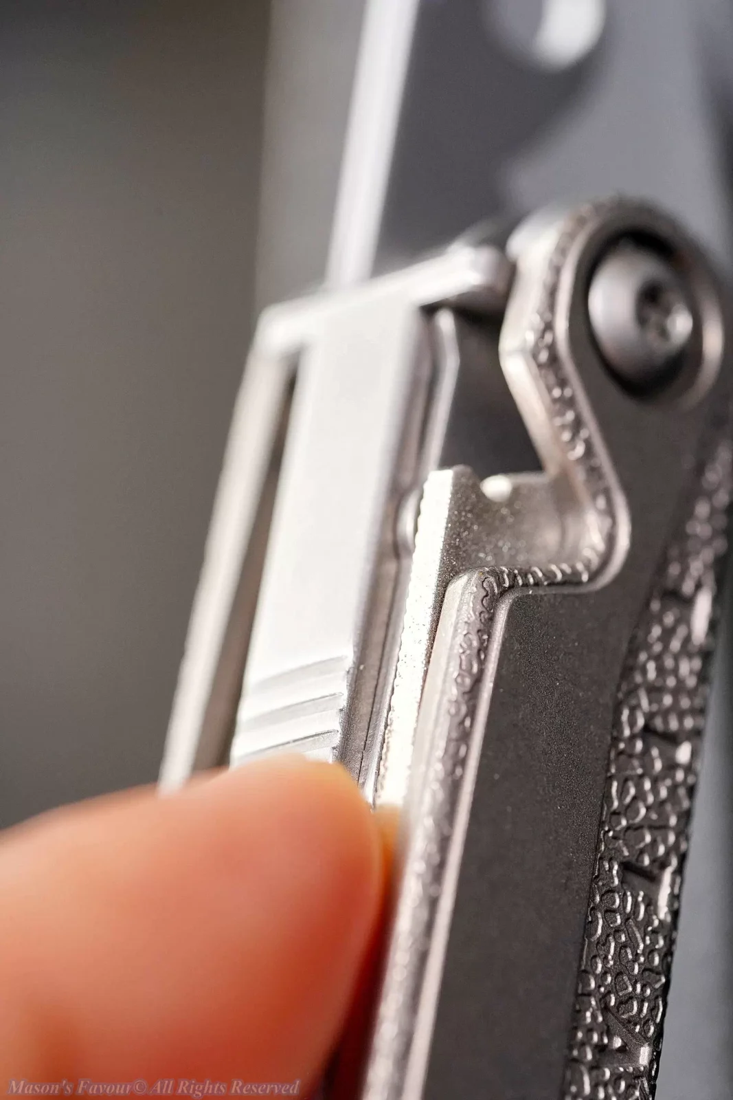Leatherman Charge+ TTI - Safety Lock for Can&Bottle Opener, Releasing State