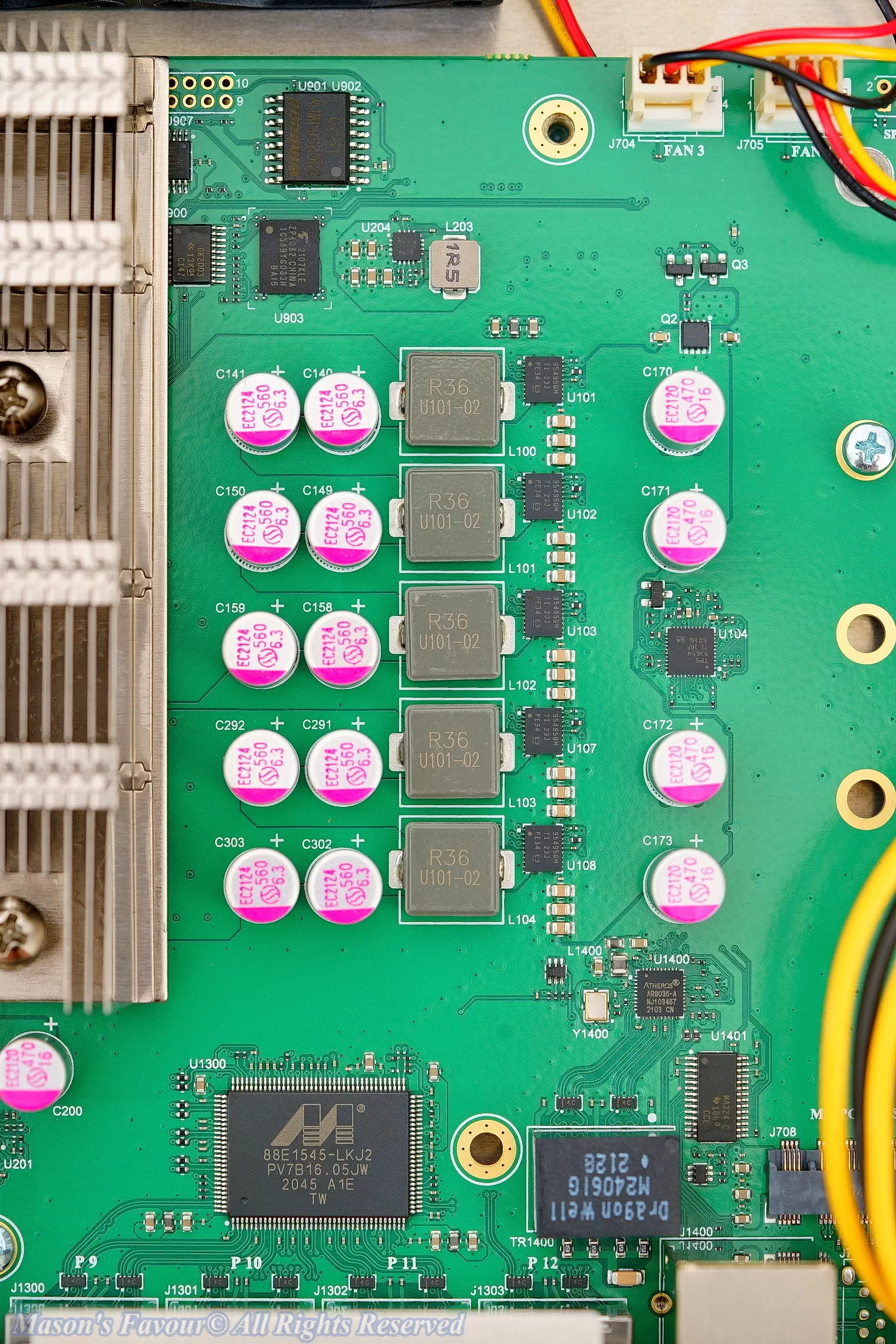 MikroTik CCR2116, Teardown, Cacacitors and Marvell Chip on the Right Side of the Heatsink, Top