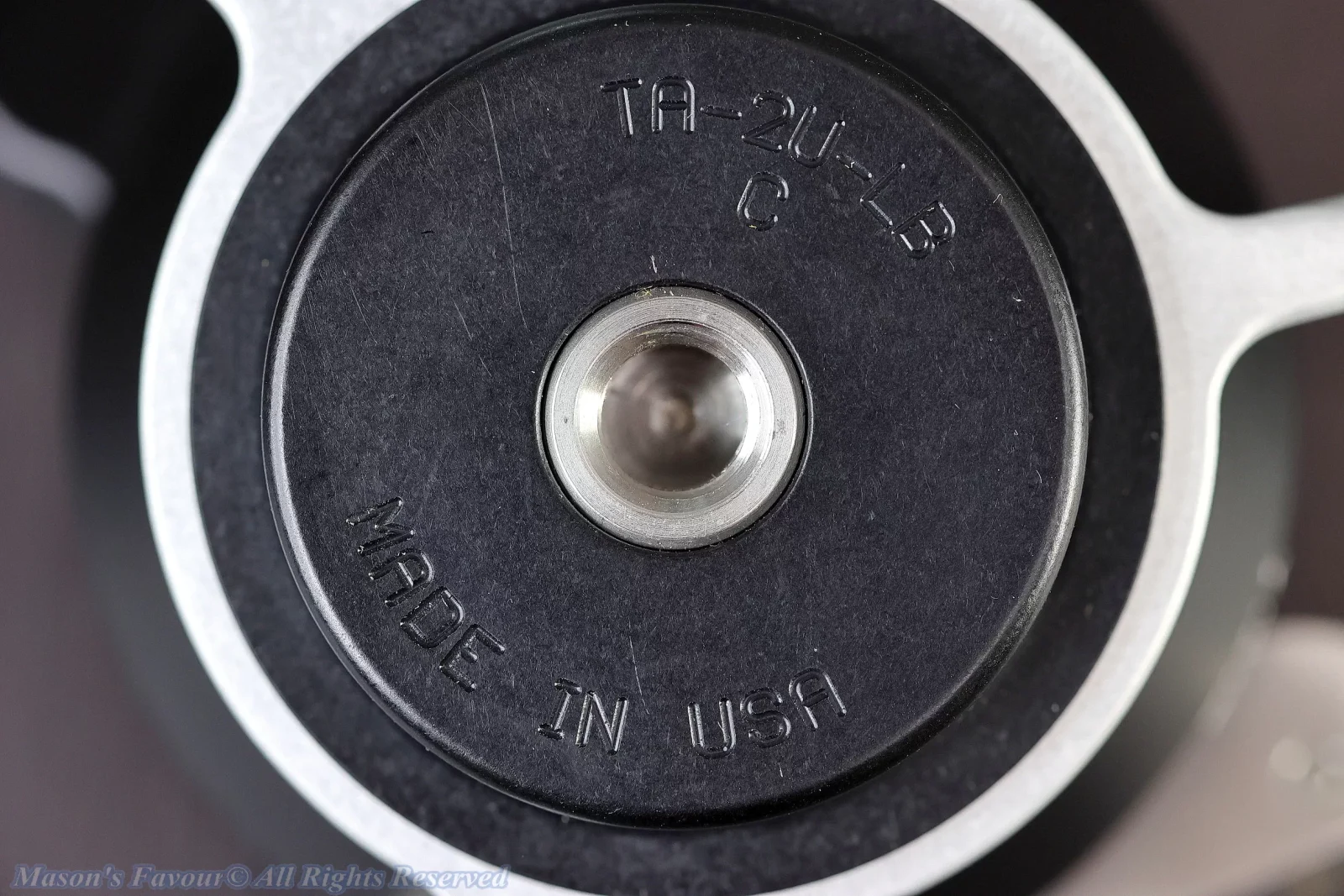 Really Right Stuff (RRS) TA-2U-LC Lever-Release Leveling Base - Bottom with a Central Stainless Steel Cylinder Bushing including a 3/8" Screw Hole, Type and "Made in USA" Marks, Enlarged view
